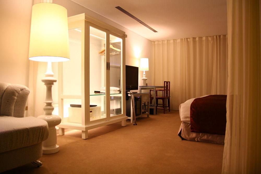Hotel Green World Mai - Zhongshan 3*