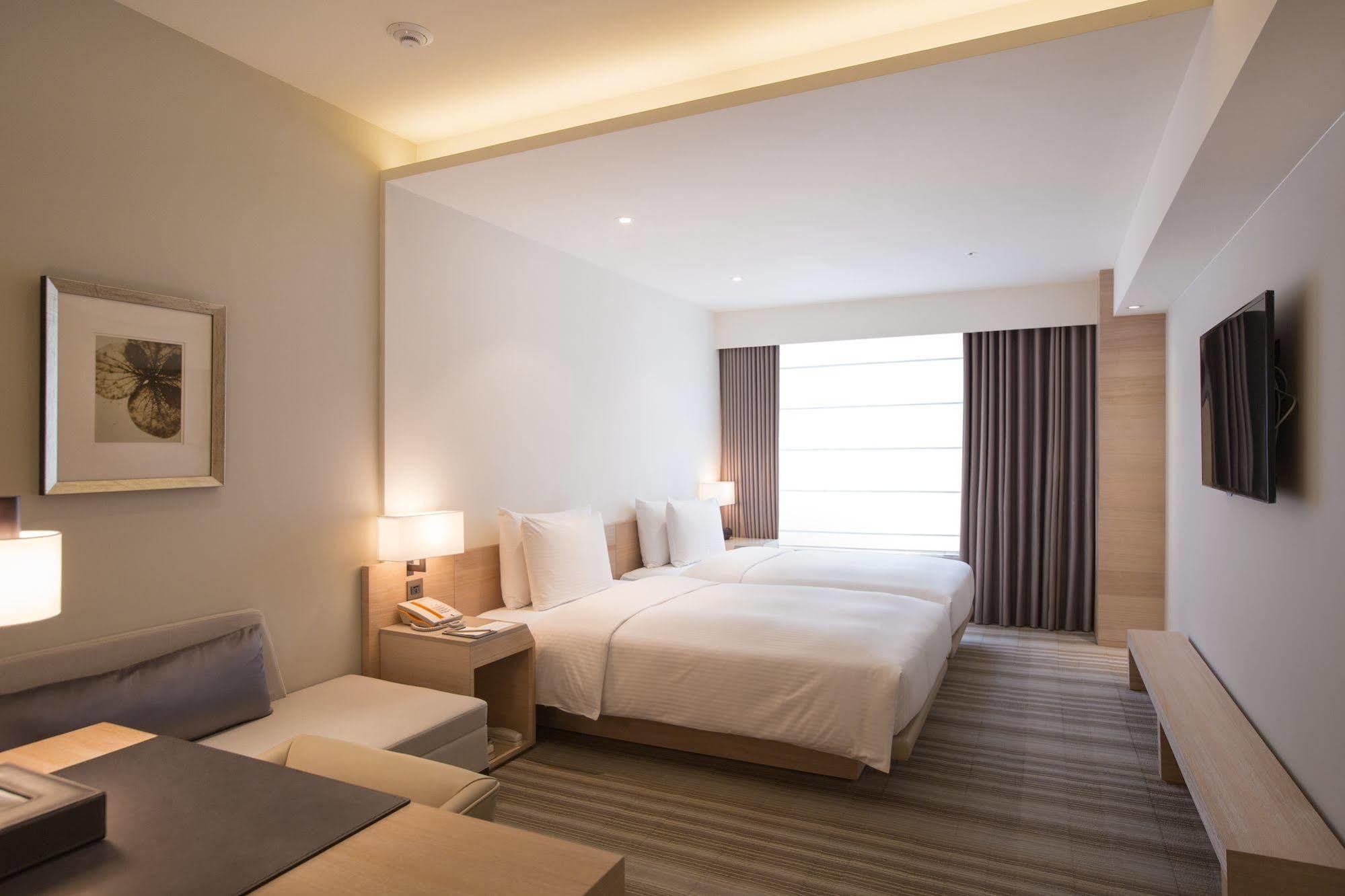 Hotel Cozzi Zhongxiao 4*